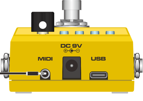 the nux loop core pedal a yellow device with a black button on it