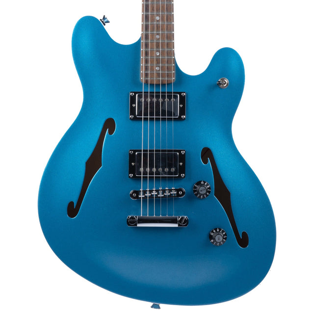 Blue electric guitar on a white background